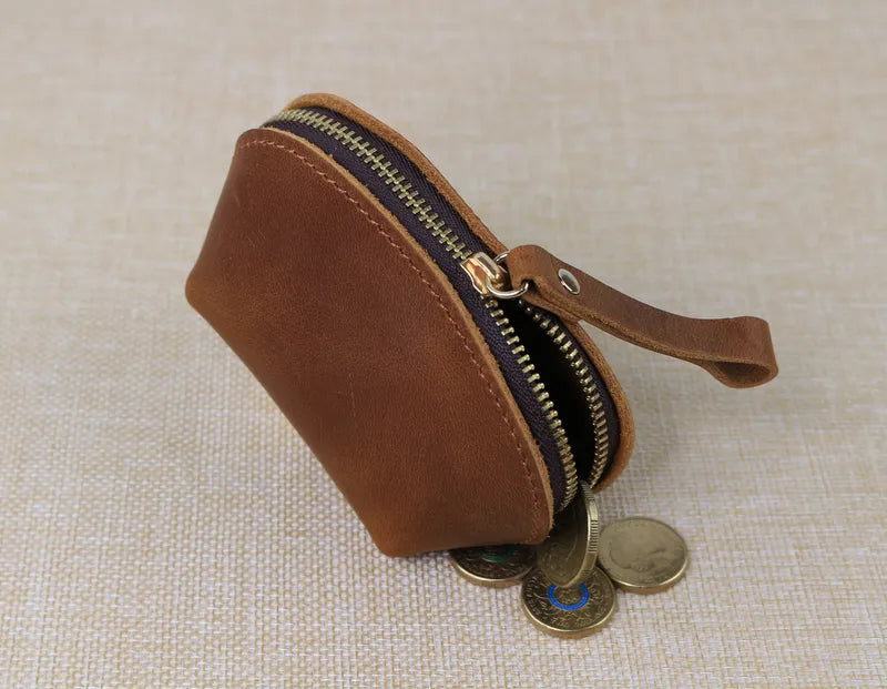 brown leather cute coin purse with zip closure to keep coins safe and organized.