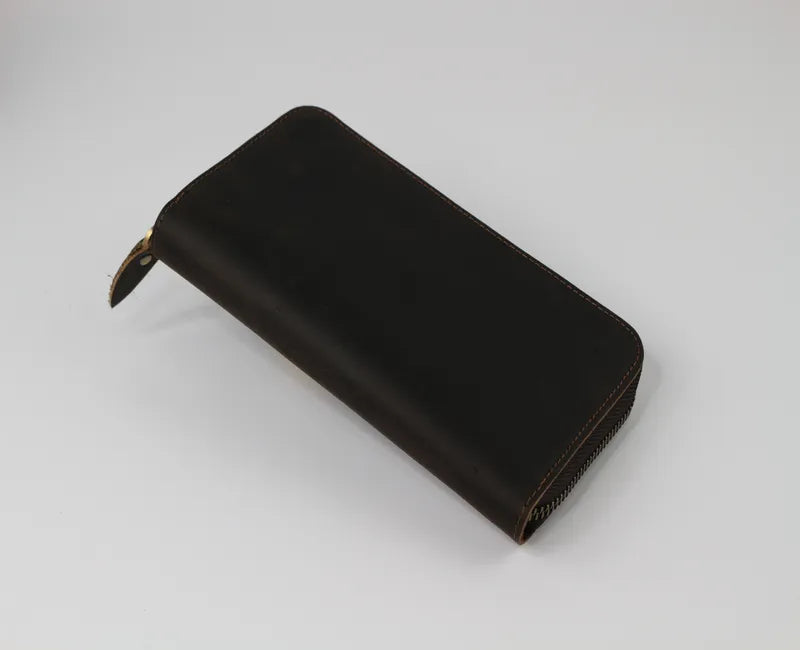 zip around wallet made of brown leather , designed and crafted by TASCONY