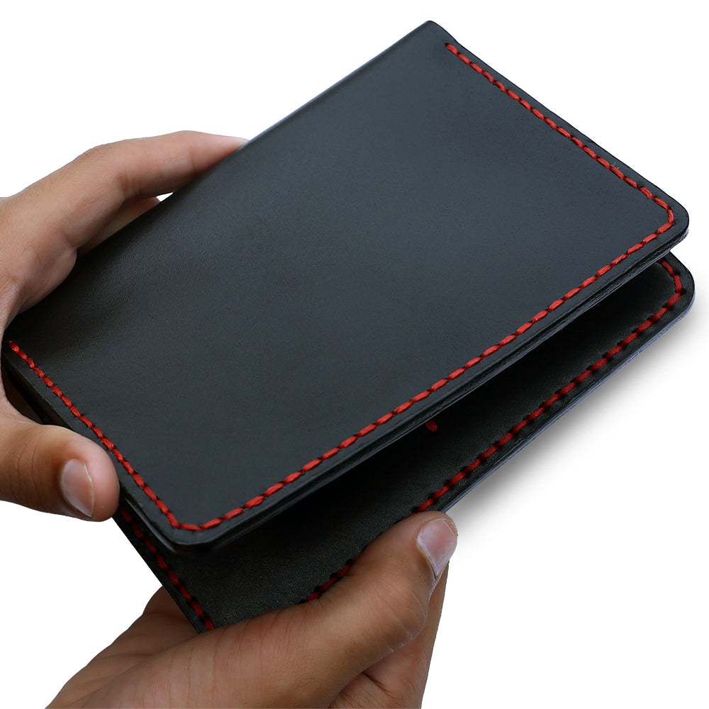 Handmade Black Passport Holder In Hand
