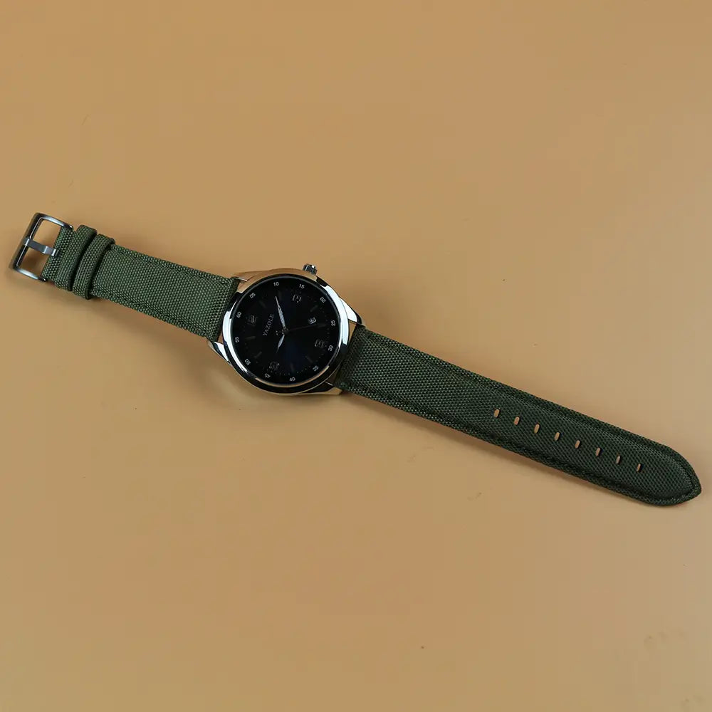 Green Sailcloth Watch Strap Attatched to Dial