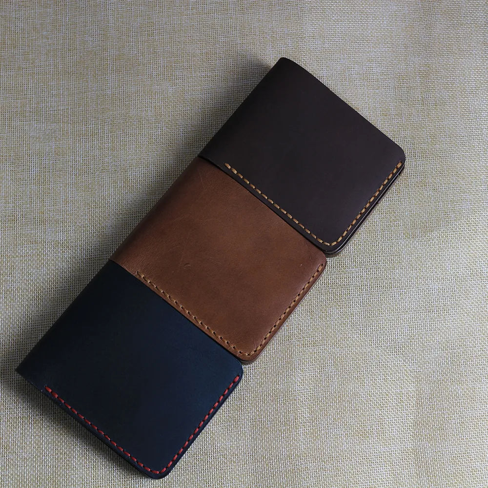 set of handmade bifold leather wallets for men in brown, dark brown and black