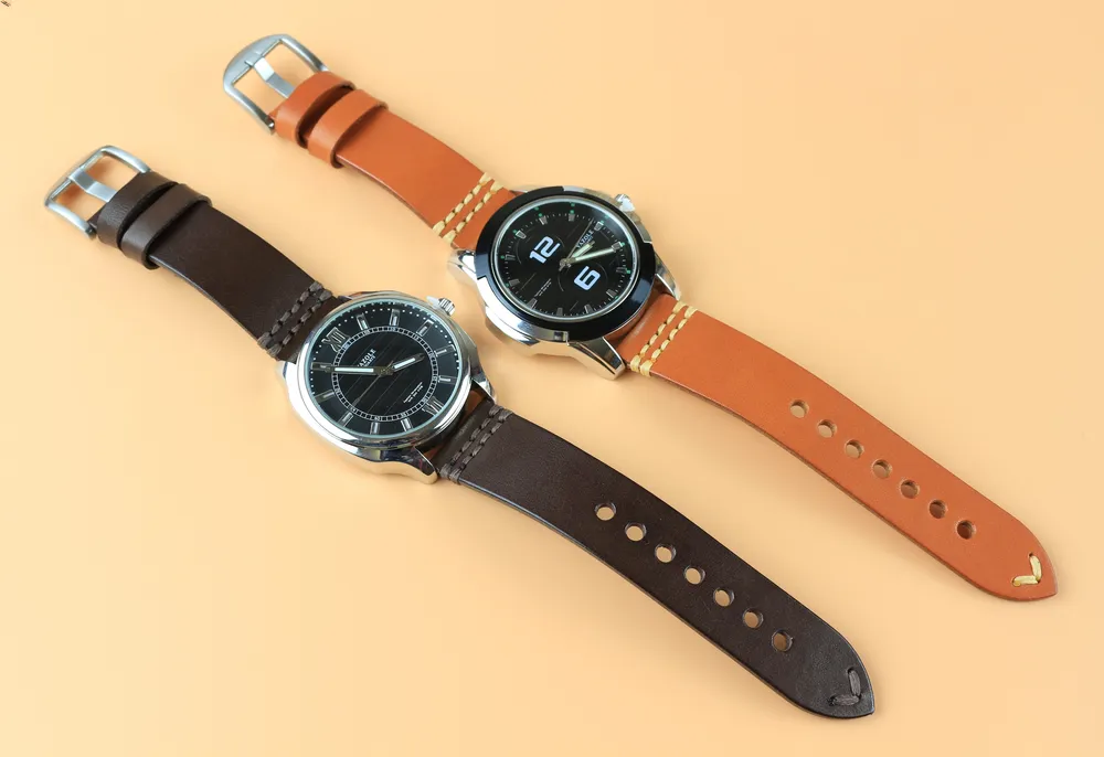 A perfect display of Dark brown and orange vegetable tanned Leather watch strap