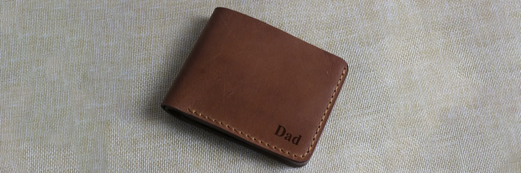 Handmade Brown leather wallet lying on a table