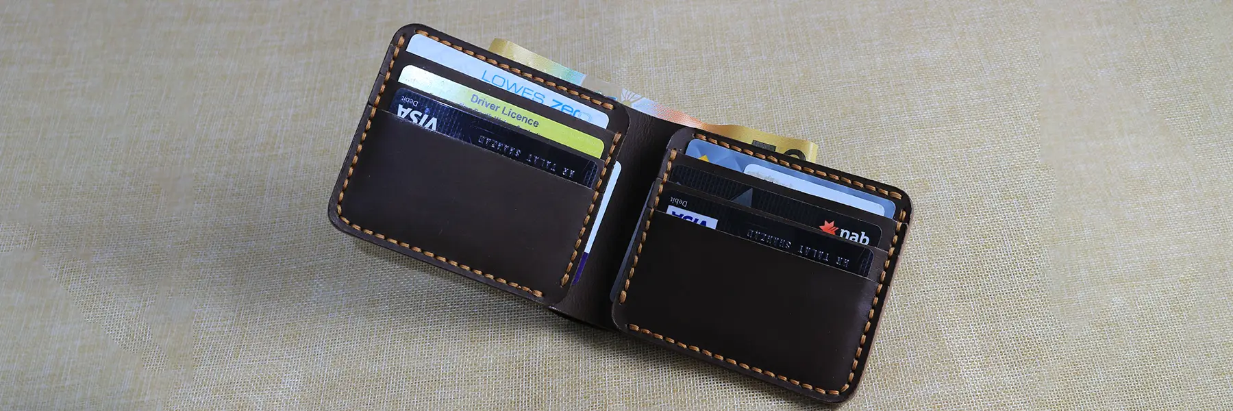 dark brown beautiful handmade wallet carrying cards and cash
