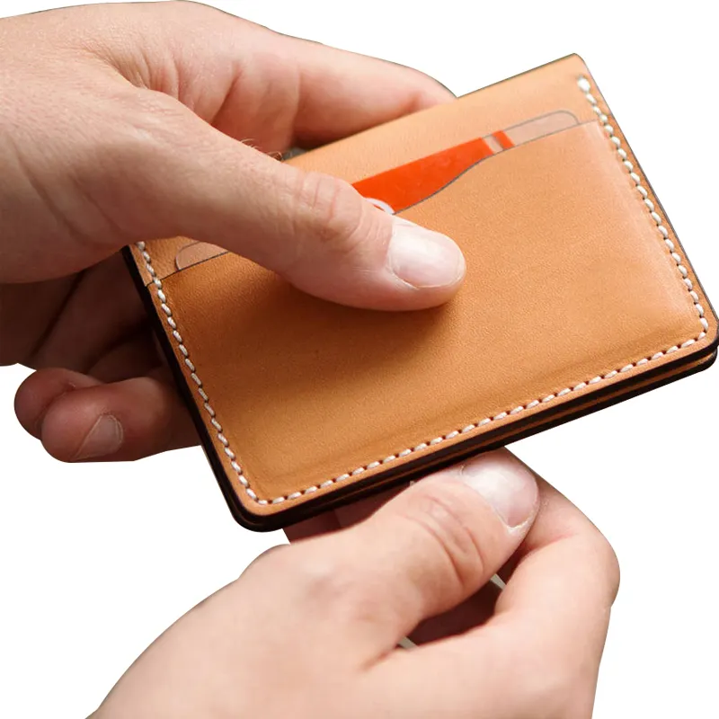 a person holding a wallet